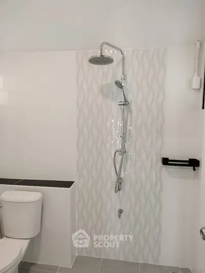 Modern bathroom with stylish shower and sleek tile design