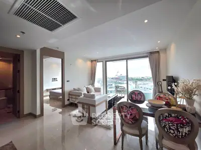 Luxurious modern living room with stunning city view and elegant decor