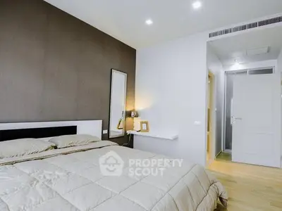 Modern bedroom with stylish decor and cozy ambiance