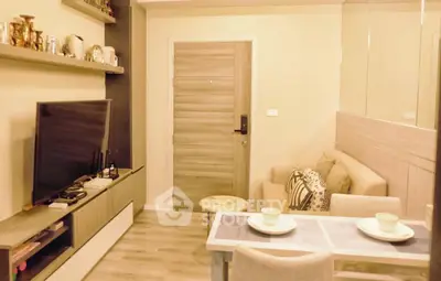 Cozy living room with modern decor and dining area, perfect for relaxation.