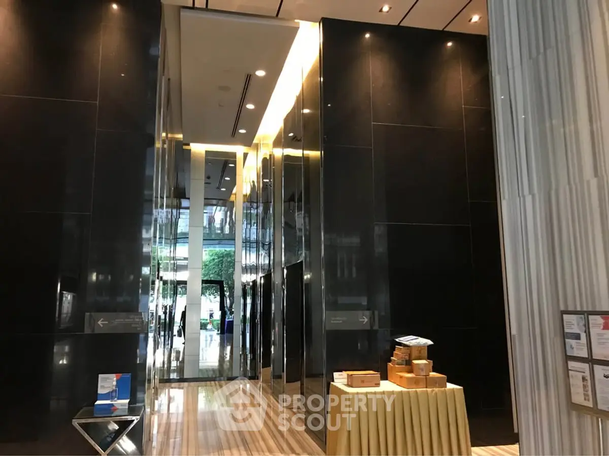 Luxurious building entrance with modern design and elegant decor