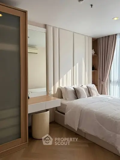 Modern bedroom with elegant decor and natural light