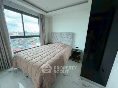 Modern bedroom with stunning city view and elegant decor