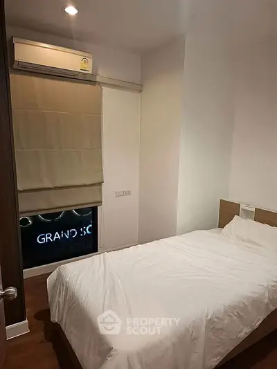 Cozy bedroom with air conditioning and modern decor in a stylish apartment.