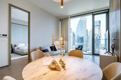 Luxurious modern apartment with stunning city view and elegant interior design.