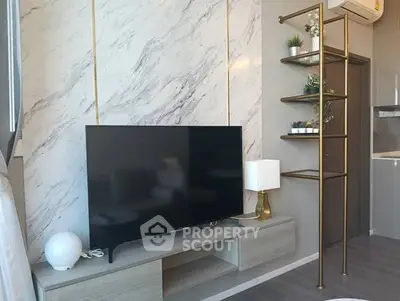 Modern living room with stylish TV setup and elegant decor