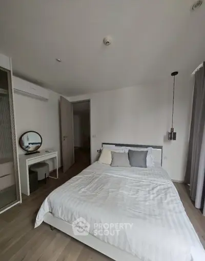 Modern bedroom with stylish decor and cozy ambiance