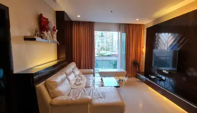 Luxurious living room with modern decor and city view balcony