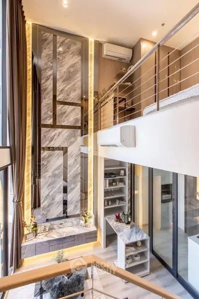 Luxurious modern duplex with high ceilings and elegant marble accents