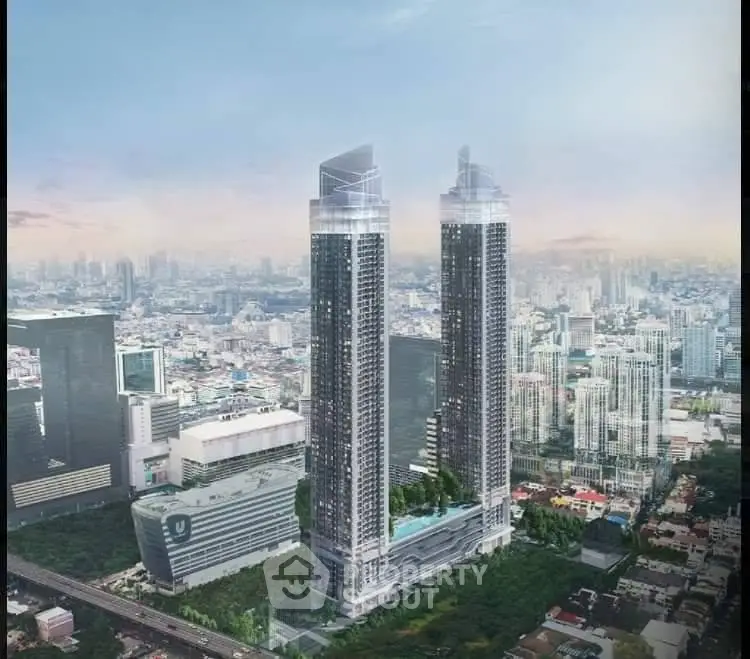 Stunning aerial view of modern twin skyscrapers in bustling cityscape, showcasing luxury urban living.