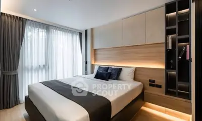 Modern bedroom with stylish decor and natural light