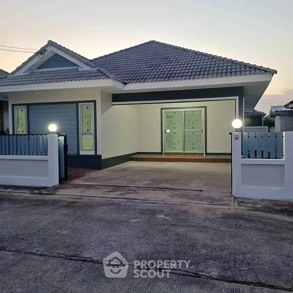 Charming single-story home with modern design and spacious driveway