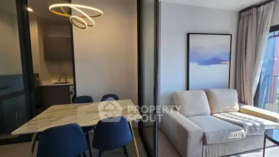 Modern living room with elegant dining area and stylish decor
