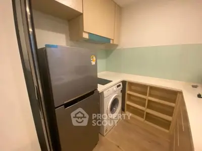 Modern kitchen with sleek cabinetry and open layout design