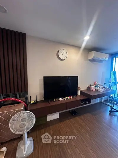 Modern living room with sleek TV setup and stylish decor