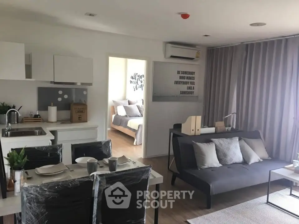 Modern open-plan living room with dining area and stylish decor