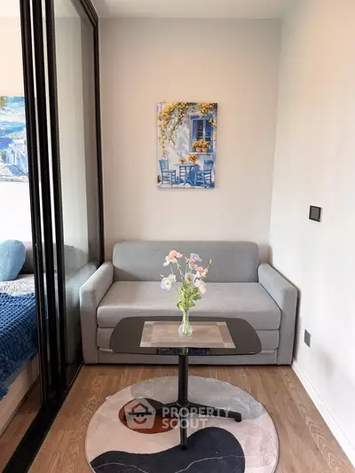 Charming small living area with cozy sofa and stylish decor