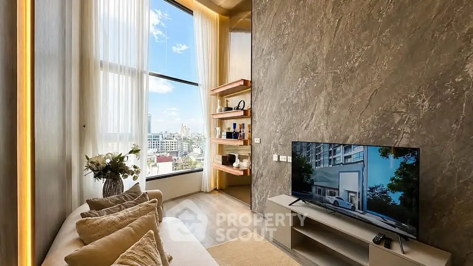 Luxurious living room with high ceilings and stunning city view