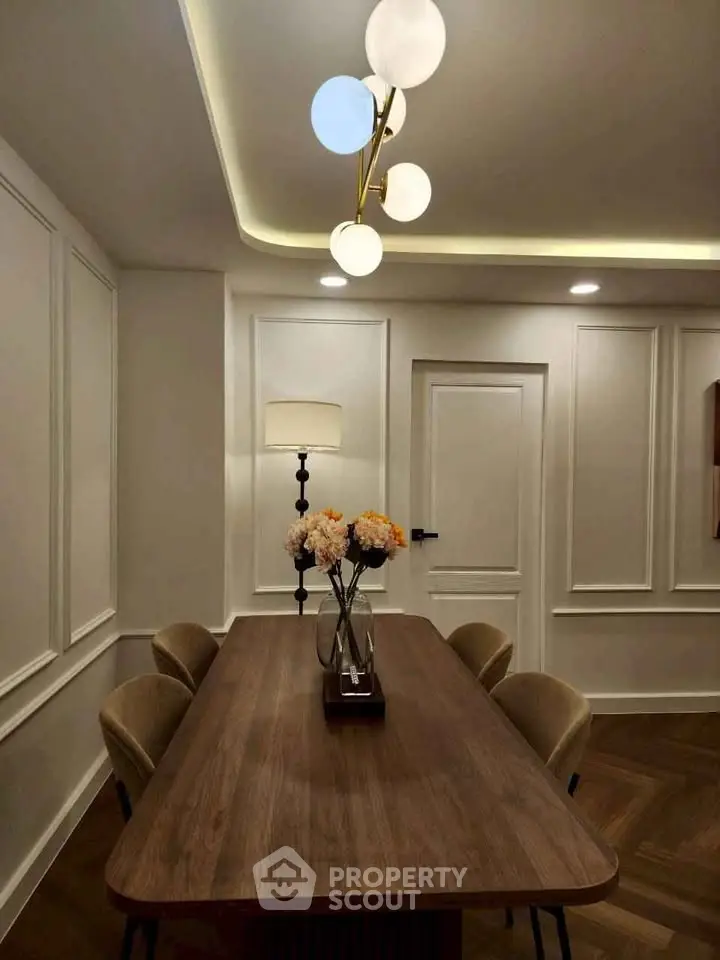 Elegant dining room with modern lighting and stylish decor