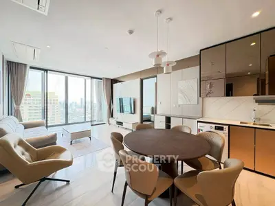 Spacious modern living room with panoramic city views and elegant dining area.