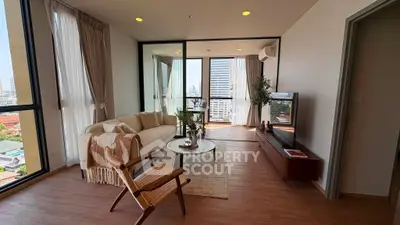 Spacious modern living room with city view and elegant decor