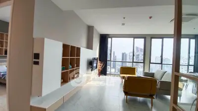 Modern living room with panoramic city view and stylish furniture