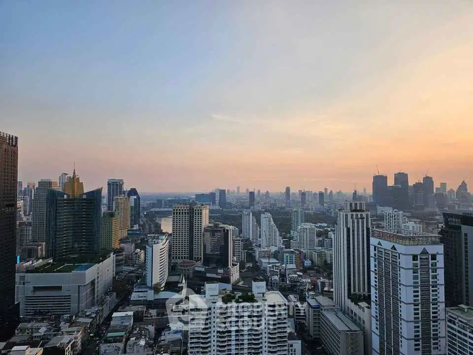 Stunning cityscape view showcasing a vibrant skyline at sunset, perfect for urban living enthusiasts.