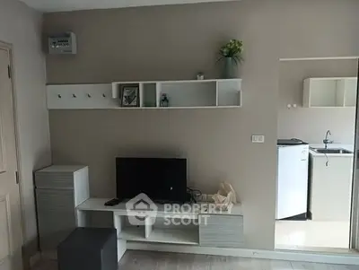 Modern living room with sleek TV stand and minimalist decor