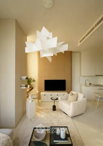 Elegant modern living room with stylish chandelier and cozy seating area