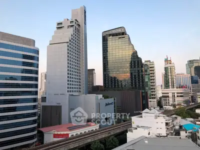 Stunning cityscape view showcasing modern high-rise buildings and urban skyline.