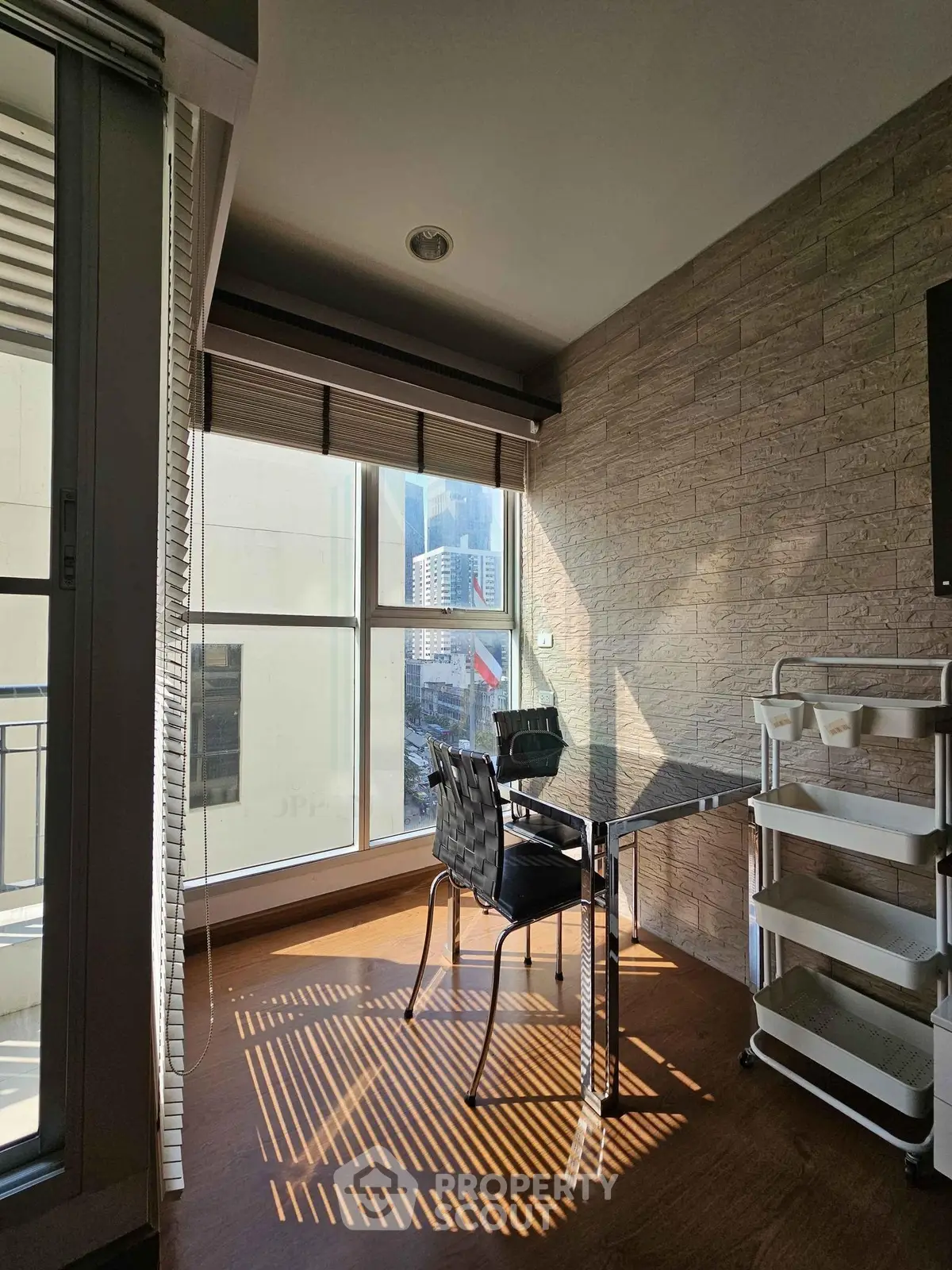 Modern study room with large windows and stylish furniture in urban apartment