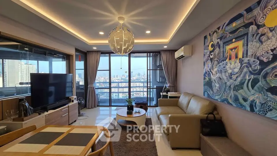 Modern living room with city view, stylish decor, and open layout in high-rise apartment.