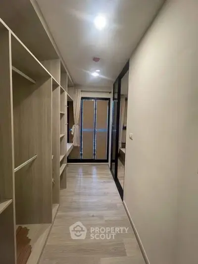 Spacious walk-in closet with modern design and ample storage space