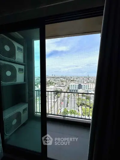 Stunning high-rise balcony view with cityscape and air conditioning units.