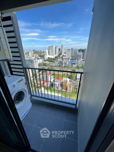 Modern balcony with city view and washing machine, perfect for urban living.