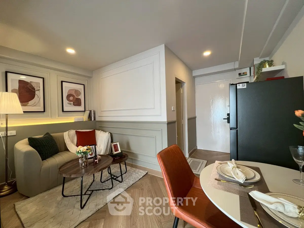 Stylish modern living room with cozy seating and elegant dining area