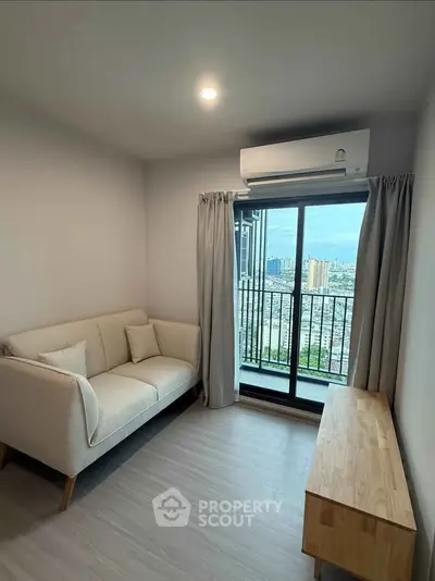 Cozy living room with city view balcony in modern apartment