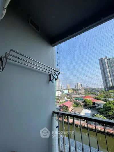 Charming balcony with city view, perfect for relaxation and enjoying the skyline.