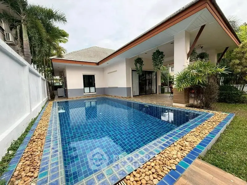 Stunning villa with private pool and lush garden in tropical setting