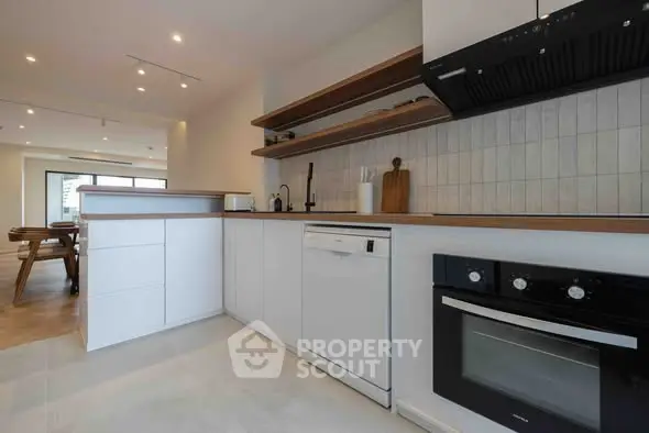 Modern kitchen with sleek appliances and open layout design