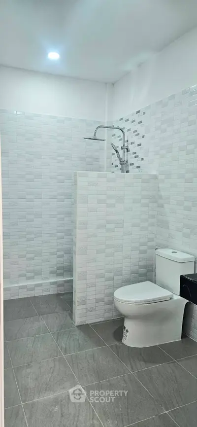 Modern bathroom with sleek tile design and contemporary fixtures