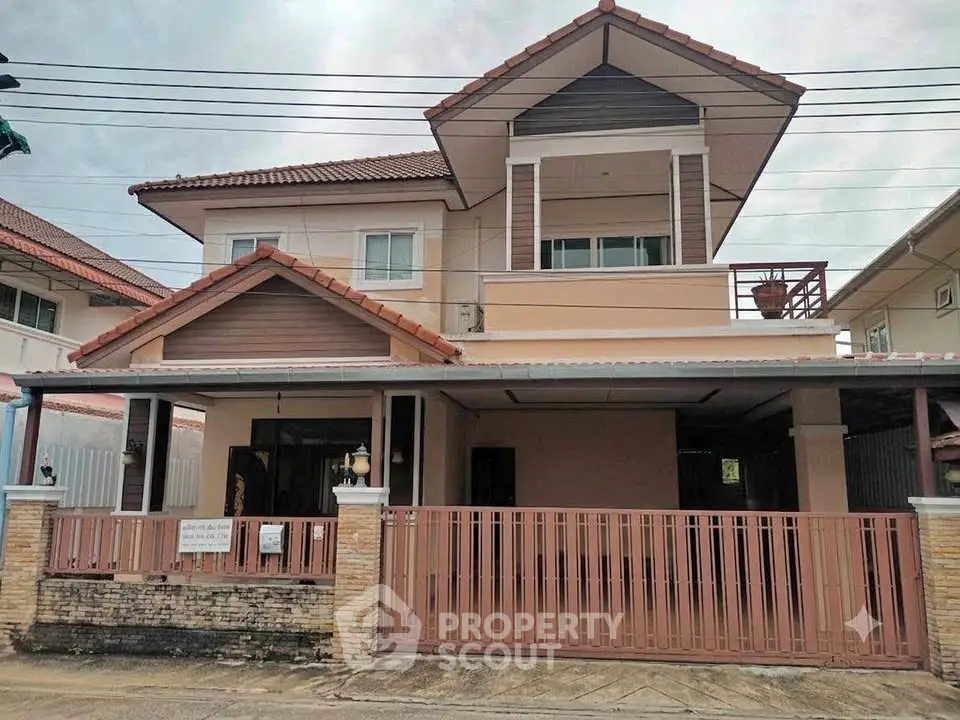 Charming two-story house with a spacious front yard and modern design in a serene neighborhood.