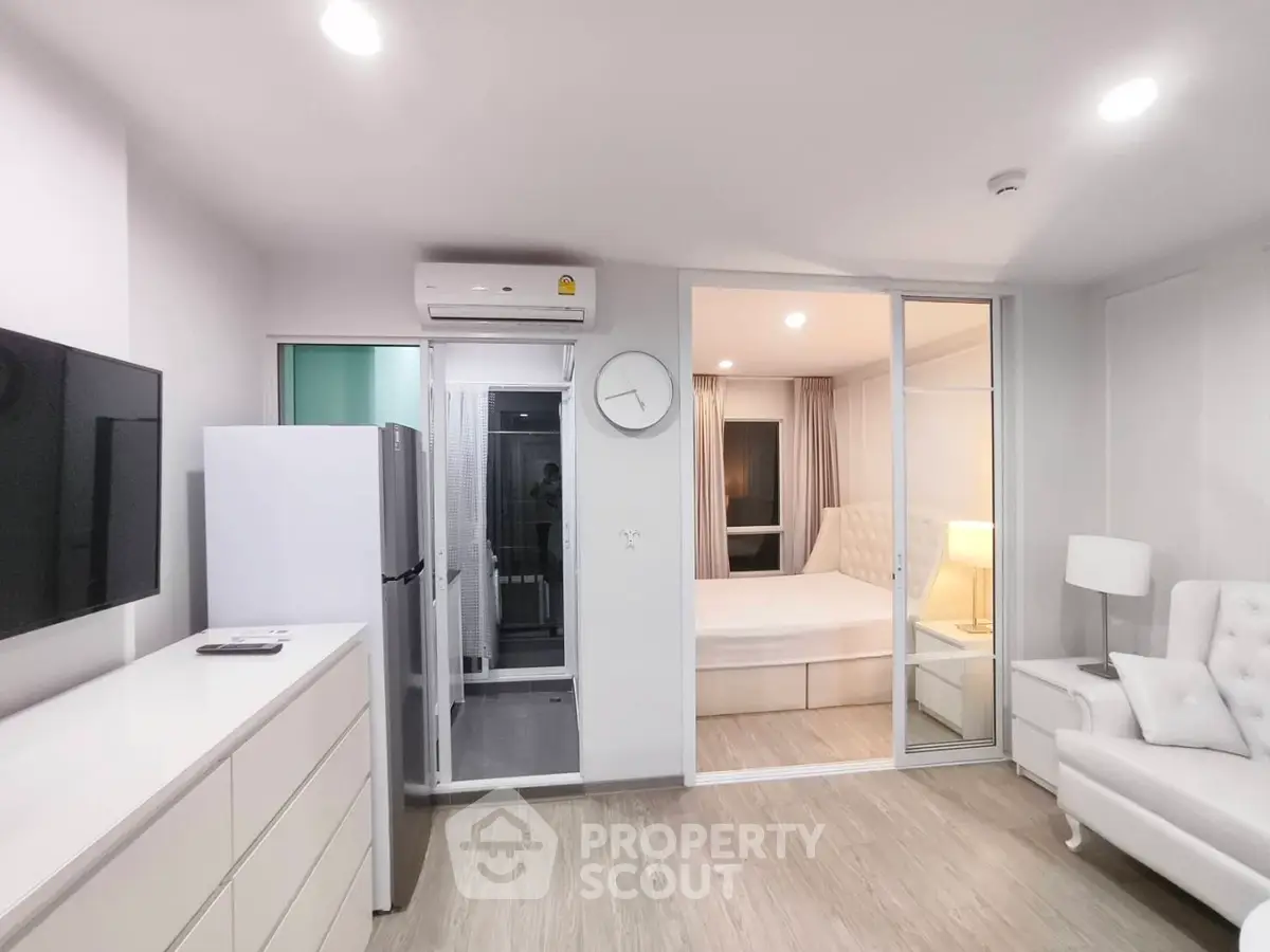 Modern apartment interior with sleek design and cozy bedroom