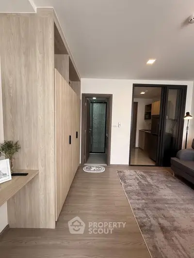 Modern apartment interior with sleek wooden flooring and stylish decor