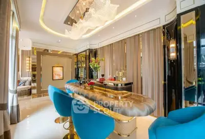 Luxurious modern living room with elegant decor and vibrant blue chairs