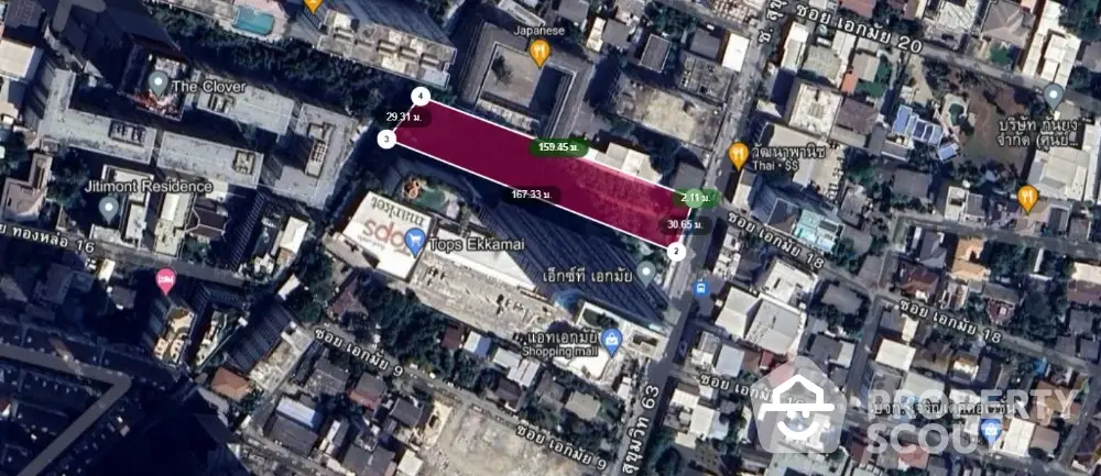 Aerial view of urban real estate development site with measurement overlay