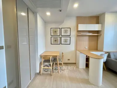 Modern living room with stylish furniture and elegant decor in a cozy apartment.