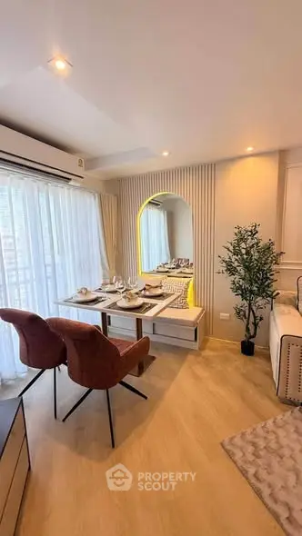 Stylish dining area with elegant decor and natural light in modern apartment