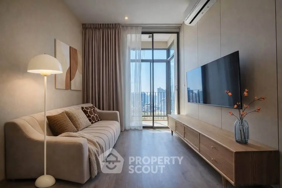 Modern living room with stylish decor and balcony view