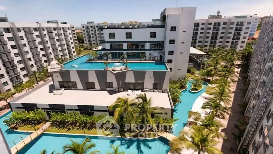 Luxurious modern apartment complex with stunning rooftop pool and lush landscaping.